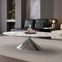 Table basse ovale de luxe en acier inoxydable avec plateau en marbre pour hôtel et salon