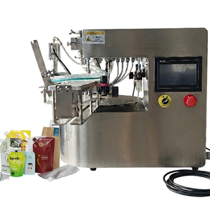 Máquina de llenado de boquillas, máquina de tapado y envasado de sobremesa, fácil de operar, configuración digital que le permite guardar parámetros para el - Product Image 1