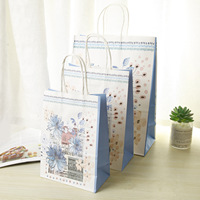 Bolsas de Papel Impresas Blancas Recicladas Biodegradables de Lujo Hechas a Mano con Logotipo Personalizado de Bajo MOQ para Embalaje de Regalos Artesanales