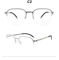 Montures de lunettes optiques personnalisées OEM en acier inoxydable fin, style rétro, motif martelé, pour jeunes hommes, vente en gros