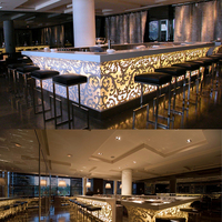 Meubles de bar portables à surface solide LED Staron au design luxueux et vintage pour comptoir de bar d'hôtel avec éclairage lumineux et lueur