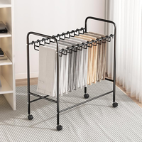 Chiffons de rangement pour la maison Séchoir à linge Support en métal noir Cintres pour pantalons et jupes