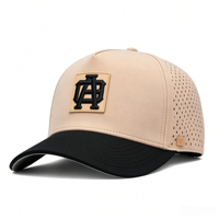Casquette de baseball/trucker OEM personnalisée imperméable 5 panneaux bicolore perforée au laser motif fruits/points pour le sport avec logo en caoutchouc