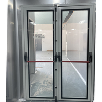 Porte de sortie d'urgence moderne en verre trempé avec barre anti-panique, structure en acier durable, isolation thermique