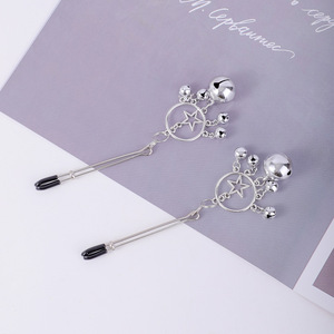 Pinces à tétons style étoile argentées, jouets de stimulation pour adultes, accessoires de bondage pour hommes et femmes - Product Image 1