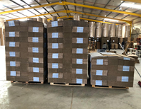 Machine automatique de fabrication de boîtes en carton ondulé avec imprimante flexographique quatre couleurs, plieuse, encollatrice, rainureuse et découpeuse