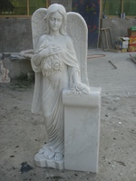 Stèles et monuments funéraires modernes en marbre blanc et noir, statues en granit personnalisées