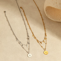 Collier pendentif tendance rétro double couche en acier inoxydable plaqué or avec chaîne en bambou, croix, étoile et rond
