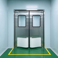 Puerta de Tráfico de Doble Hoja de Acero Inoxidable con Cierre Automático, Aislamiento Térmico y Anticolisión para Cocina y Mercado