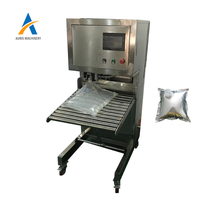 Machine automatique de remplissage bouchage de poche de bavoir aseptique liquide jus de vin rouge eau lait huile d'olive remplissage de sac dans la boîte