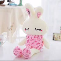 Vente en gros de lapin à longues pattes lumineux de dessin animé LOVE peluche douce animal lapin à DEL