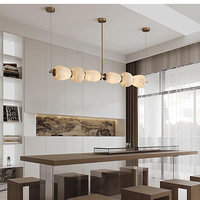 Lustre en marbre d'albâtre espagnol de luxe haut de gamme en cuivre, design moderne et minimaliste, longue bande, pour salle à manger, bar, réception