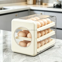 Organisateur d'œufs de type tiroir avec plateau à roulement automatique, boîte de rangement empilable en PP de qualité alimentaire avec joint anti-poussière pour cuisine et maison.