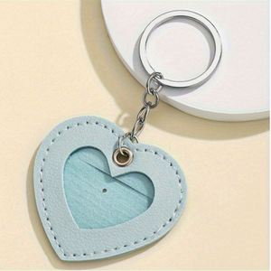 Porte-clés moderne en forme de cœur en cuir PU, pendentif de sac à main, accessoire charmant pour filles, sacs de téléphone, breloque élégante pour sac - Product Image 3