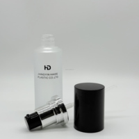 Offre spéciale Pompe à escalier argentée de luxe et couvercle noir Bouteille en verre dépoli de 35ml