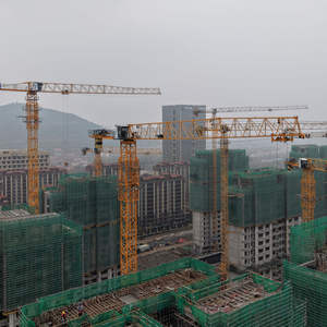 Grue à tour à plateau plat Dahan 10 tonnes QTZ125-6015, hauteur de levage maximale de 200 m, portée de 60 m, conception sans flèche, moteur haute efficacité, construction - Product Image 1