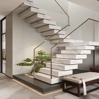 Escalier droit flottant moderne avec marches en quartz sur mesure et garde-corps en verre pour l'intérieur de la maison