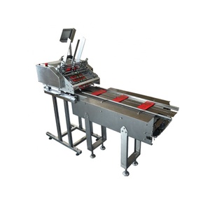 Guangdong automatico cartone A4 carta tessuto etichette libri scatole istruzioni di carta alimentazione di attrito macchina alimentatore carta alimentatore - Product Image 1