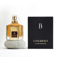 Flacon de parfum élégant et luxueux de 100 ml, nouveau design, flacon atomiseur en verre doré avec boîte