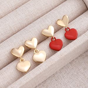 Boucles d'oreilles clous géométriques et en forme de <span class=keywords><strong>c</strong></span>œur en alliage de zinc plaqué or - Double anneau en <span class=keywords><strong>C</strong></span> et design torsadé - Cadeau tendance pour femme - Product Image 1