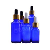 Mattierte Blaue Glasfläschchen mit Siebdruck-Etiketten & Goldprägung für Kosmetik-Körperöl-Verpackungen