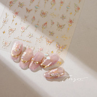 Autocollants pour ongles en forme de papillon et de branche de fleurs en or rose, design élégant et luxueux pour la manucure DIY à domicile
