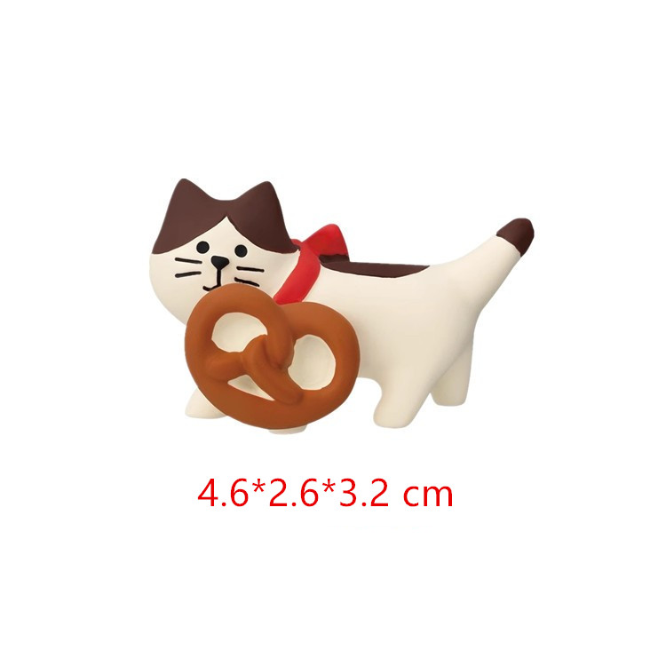 Manger un gâteau à nœuds chat