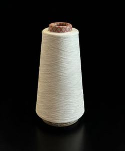 Reciclaje <span class=keywords><strong>GRS.</strong></span> Ne 28s+40D Poliéster/viscosa/spandex-63/33/4. Reciclaje <span class=keywords><strong>GRS.</strong></span> Hilo de Fibra Central. (Blanco Crudo) - Product Image 1