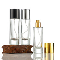 Flacon pulvérisateur de parfum en verre transparent de 30 ml, base épaisse, atomiseur à pompe, vide, rechargeable, emballage cosmétique de voyage