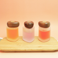 Flacon de parfum en verre de 100 ml avec bouchon à vis triangulaire givré en bois de hêtre, de noyer et de noyer foncé