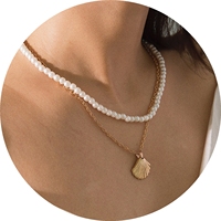 Collier ras du cou Double couche pour femme, style bohémien, coquillage en perles et coquillage, coquillage festonné de plage, bijoux pour fille de l'océan, collection