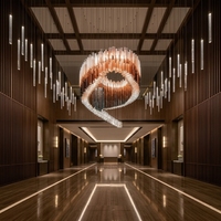 Lustre LED moderne de luxe au design artistique, grand anneau en spirale en verre, sur mesure, pour halls d'hôtel et espaces commerciaux