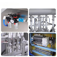 Machine de remplissage électrique automatique à quatre têtes haute vitesse pour bouteilles de boissons en verre de 200 ml (eau, lait, thé et jus)