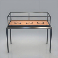 Vitrine d'exposition en verre trempé avec cadre en métal noir pour lunettes, meuble de magasin d'optique, fabricant