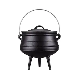 round cast iron three-legged potjie pot for dish prepared outdoors