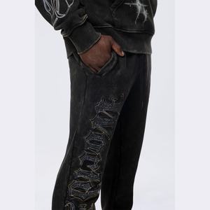 Pantalones de chándal casuales de algodón y poliéster con efecto desgastado, estilo vintage, con pedrería y lavado ácido, de forro polar negro apilado para streetwear. - Product Image 3