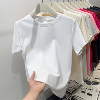 T-shirt basique en coton tricoté pour femme, nouveau pull d'été amincissant décontracté, haut à épaule droite, couleur unie simple, teint uni