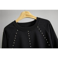 Nouvelle collection Printemps 2026 – Ensemble deux pièces en maille noire cloutée à col rond pour femme, avec pantalon large à cordon de serrage – Idéal pour le quotidien