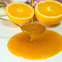 Vente en gros de sirop concentré de jus d'orange de 2.5kg saveur sucrée et fruitée riche pour le thé à bulles emballé dans des bouteilles