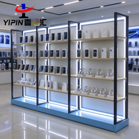 Support d'affichage de téléphone portable en acier inoxydable brossé OEM avec trou pour câble, idéal pour les centres commerciaux