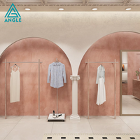 Système de présentoirs modulaires en métal professionnels personnalisés pour magasins de vêtements, aménagements de boutiques de détail, design intérieur pour vêtements de sport