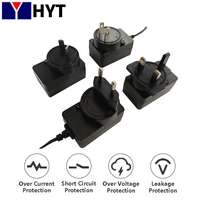 Adaptador de Corriente Desmontable con Clavijas para EE. UU., UE, Reino Unido y Australia, con Cabezales Intercambiables AC/DC