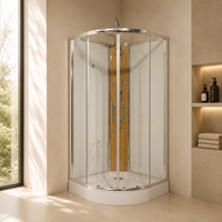 Cabine de douche quadrant sur mesure avec cadre chromé, porte coulissante en verre teinté et panneau de douche en or brossé pour projet hôtelier