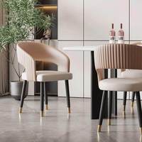 Fauteuil de salle à manger en acier inoxydable de style italien, luxe léger, design moderne et minimaliste, édition designer 2024, nouveau modèle
