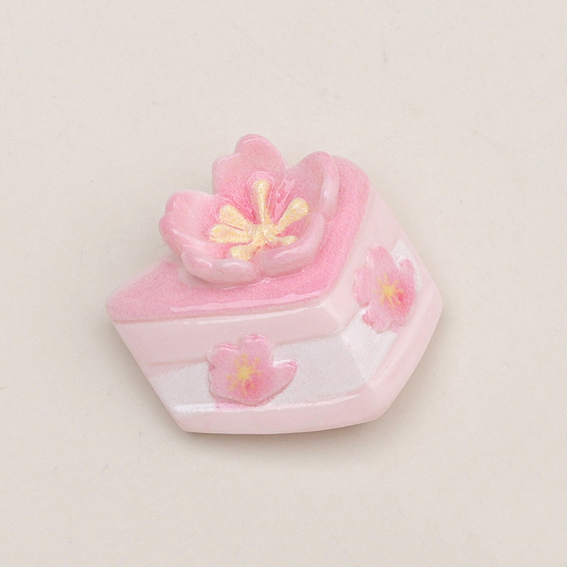 Gâteau aux fleurs roses - Triangle