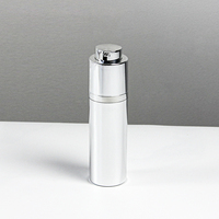 Vente en gros personnalisée Bouteille cosmétique à pompe sans air ronde en plastique métallique torsadé argent et or 15 ml 30 ml 50 ml