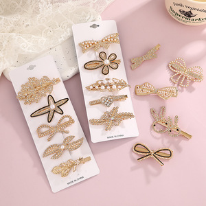Pinza para el pelo con diseño de lazo de aleación dorada y diamantes de imitación para mujer, accesorio para el cabello de uso diario. - Product Image 3