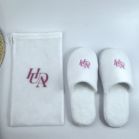 Fabricants de pantoufles d'hôtel personnalisées en polaire corail blanc, semelle épaisse en EVA, douces, écologiques, réutilisables et de haute qualité