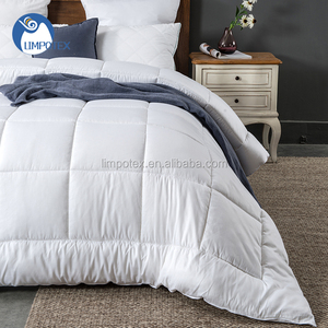 Fabricant chinois 100% <span class=keywords><strong>creuse</strong></span> <span class=keywords><strong>siliconée</strong></span> <span class=keywords><strong>polyester</strong></span> rembourrage en fibres blanc <span class=keywords><strong>couette</strong></span> - Product Image 4