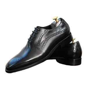 รองเท้าหนังแท้แบบ Brogue Patchwork สำหรับผู้ชาย สไตล์อังกฤษ เหมาะสำหรับงานปาร์ตี้ เดินทาง ทำงาน ใส่ได้ทุกวัน แบบผูกเชือก น้ำหนักเบา ระบายอากาศได้ดี - Product Image 1